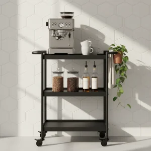 A sophisticated rolling utility cart used as a DIY home coffee bar station with an espresso machine and organized accessories.