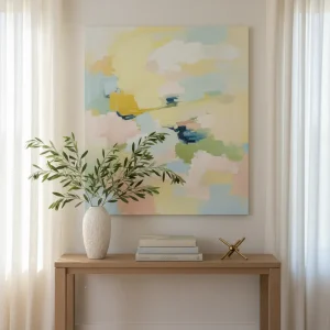 A professional interior design vignette showing spring decorating ideas for the home using the rule of three.